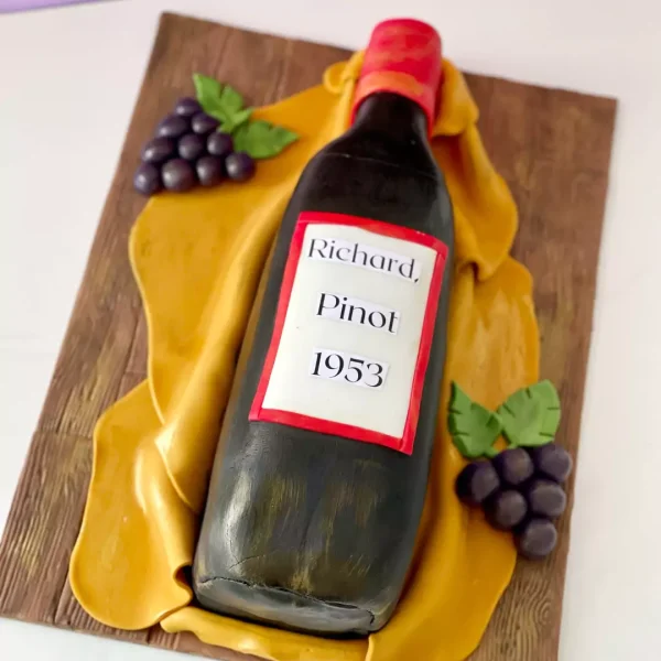 gateau rigolo aux fruits pour adulte sur le thème vigneron et commandé par un client à Nyon