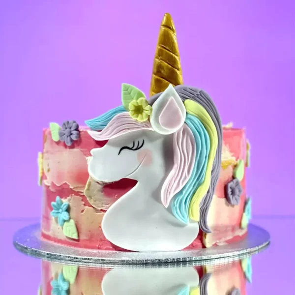 birthday cake unicorn with flowers done by best bakery in town in geneva