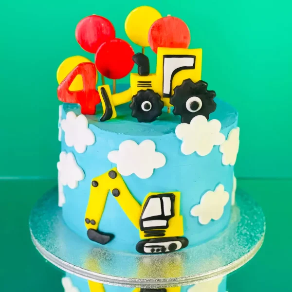 gateau anniversaire pour enfant sur le theme tracteur élaboré par la patisserie Natcake a Lausanne