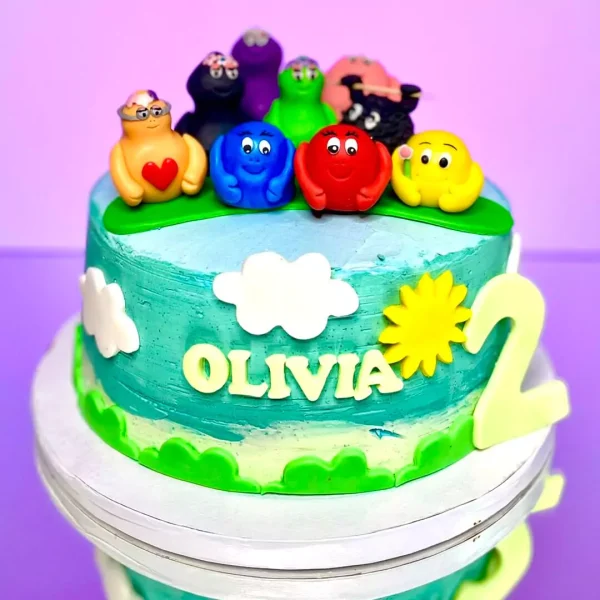 Gâteau Barbapapa famille pour anniversaire, parfait pour enfants, avec décoration colorée et design unique. Genève et Lausanne.