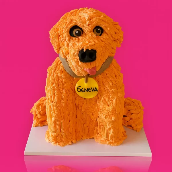 Gâteau en forme de chien 3D réaliste, style Golden Retriever avec poils texturés en crème orange, gâteau animalier sur mesure à Genève ou Lausanne.